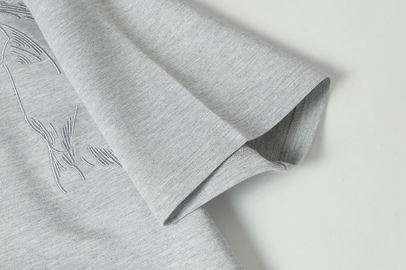 DAXUEN Short-sleeved crew-neck T-shirt with horse head embroidery