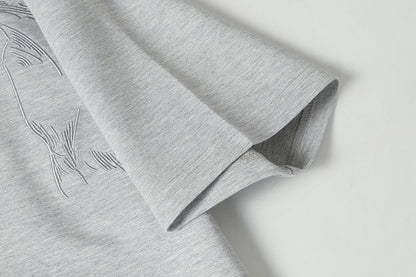 DAXUEN Short-sleeved crew-neck T-shirt with horse head embroidery