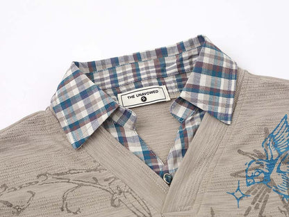 Faux-layered long sleeve plaid top
