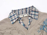 Faux-layered long sleeve plaid top