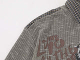 Layered long-sleeve polo shirt with bear graphic