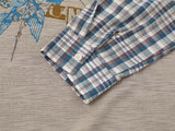 Faux-layered long sleeve plaid top