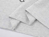 DAXUEN Relaxed-fit short-sleeved raglan t-shirt with cartoon rabbit graphic
