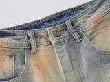 Distressed paint-splatter wide-leg denim jeans