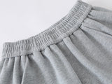 Loose-fitting wide leg sweatpants with star appliqué