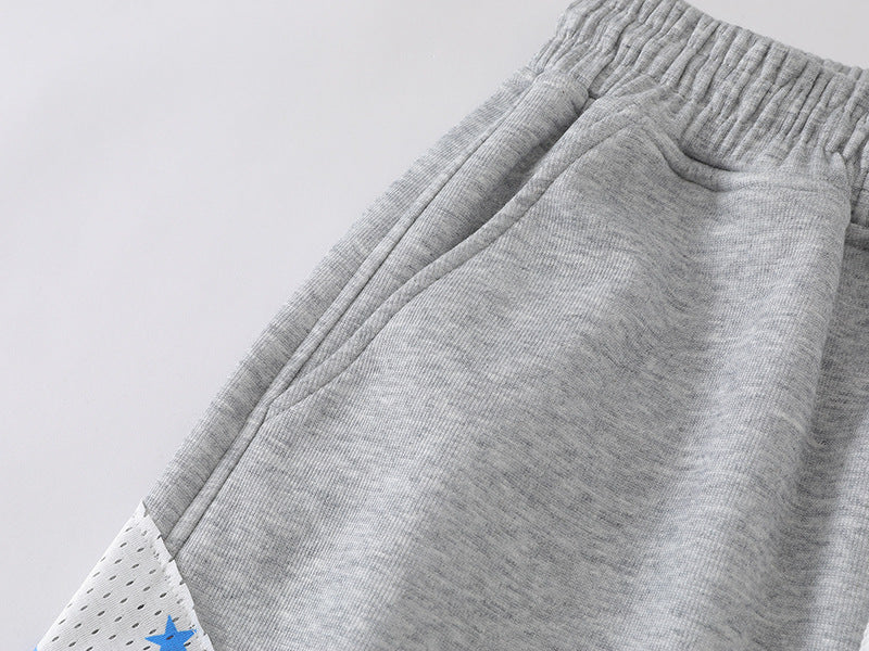 Grey wide-leg sweatpants with patchwork designs