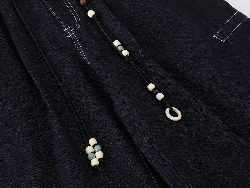 High-waisted wide-leg denim pants with bead details