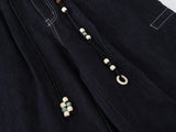 High-waisted wide-leg denim pants with bead details