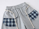 Loose-fitting balloon pants with plaid details