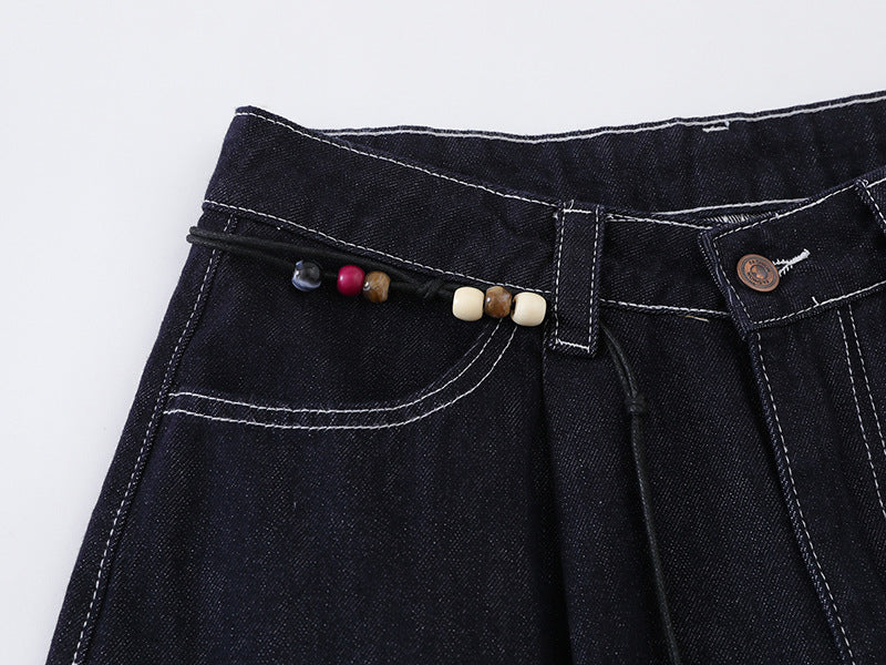 High-waisted wide-leg denim pants with bead details
