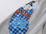 Grey wide-leg sweatpants with patchwork designs