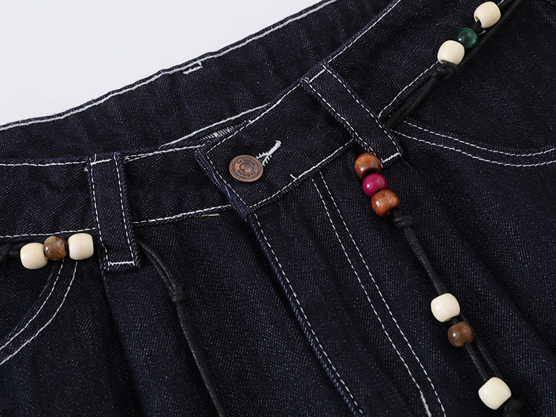 High-waisted wide-leg denim pants with bead details