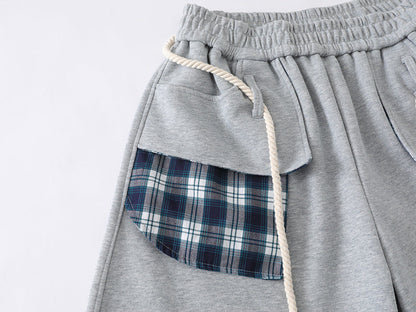 Loose-fitting balloon pants with plaid details
