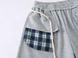Loose-fitting balloon pants with plaid details
