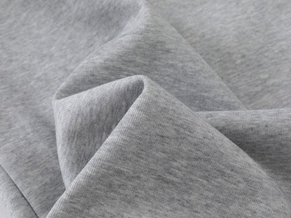 Grey wide-leg sweatpants with patchwork designs