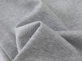 Grey wide-leg sweatpants with patchwork designs