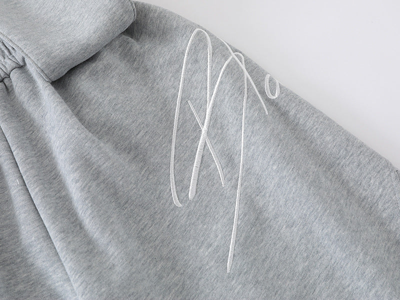 Loose-fitting wide leg sweatpants with star appliqué
