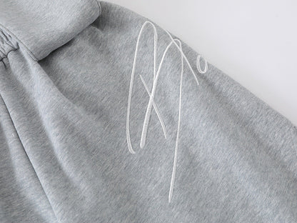 Loose-fitting wide leg sweatpants with star appliqué