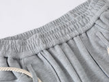 Loose-fitting balloon pants with plaid details