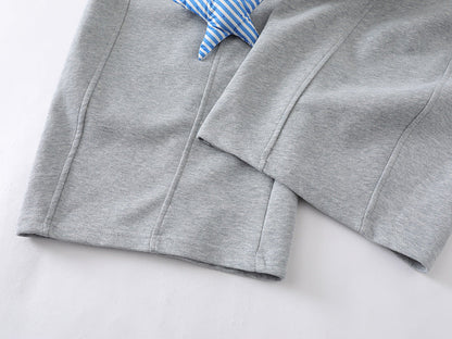 Loose-fitting wide leg sweatpants with star appliqué
