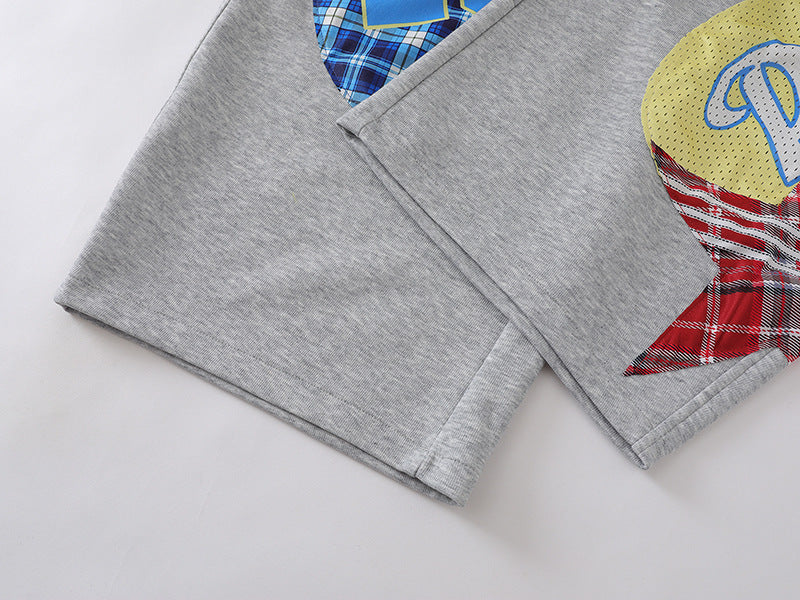 Grey wide-leg sweatpants with patchwork designs