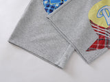 Grey wide-leg sweatpants with patchwork designs