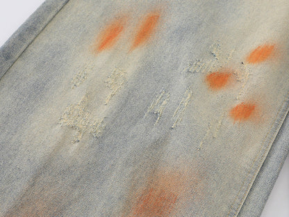 Distressed paint-splatter wide-leg denim jeans