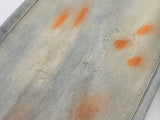 Distressed paint-splatter wide-leg denim jeans