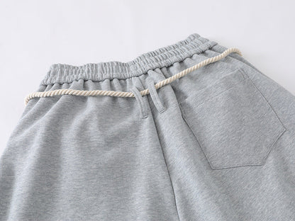 Loose-fitting balloon pants with plaid details
