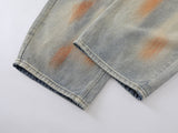 Distressed paint-splatter wide-leg denim jeans