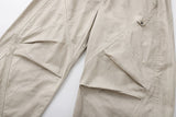 Deconstructed wide-leg cargo pants in light beige