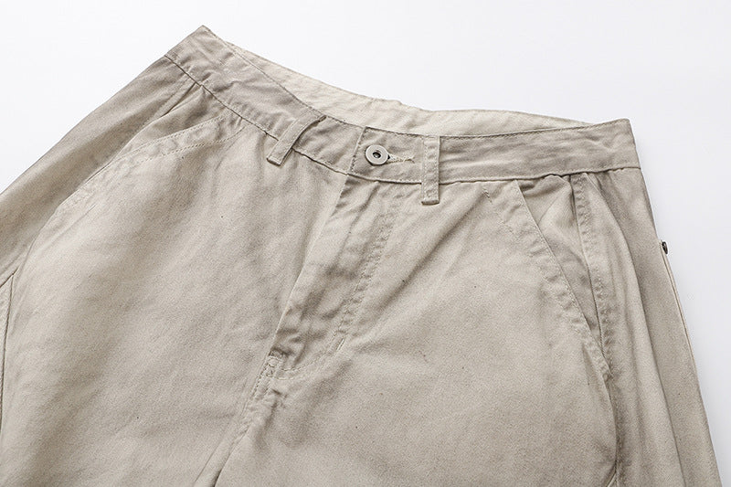 Deconstructed wide-leg cargo pants in light beige