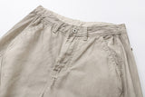 Deconstructed wide-leg cargo pants in light beige