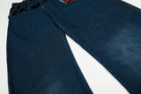 Wide-leg high-waisted denim jeans with ruffled waist