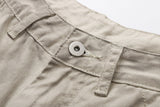 Deconstructed wide-leg cargo pants in light beige