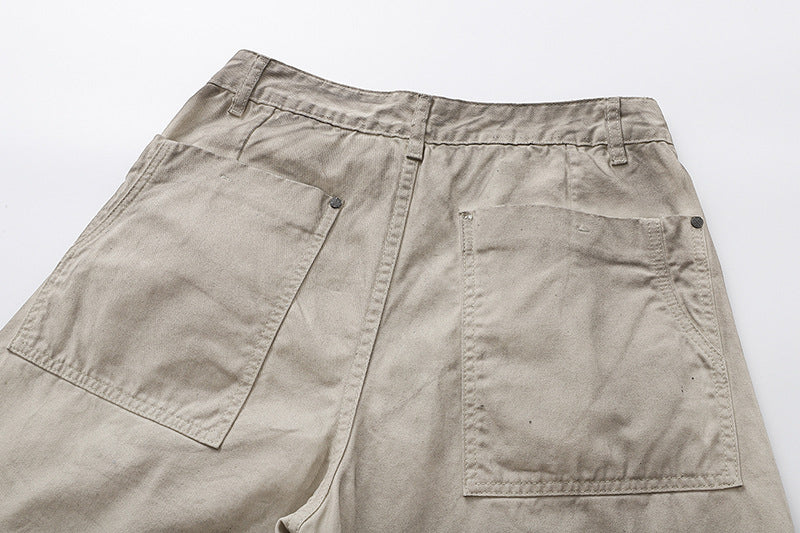 Deconstructed wide-leg cargo pants in light beige