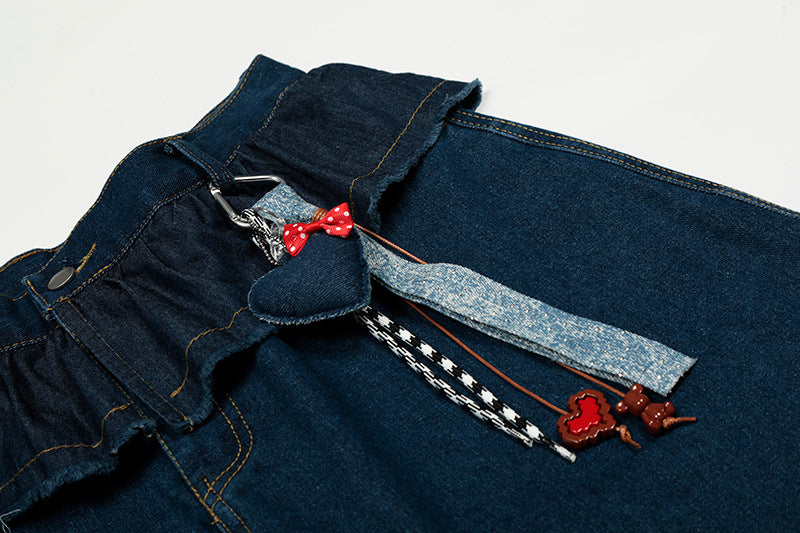 Wide-leg high-waisted denim jeans with ruffled waist