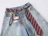 Distressed light blue baggy denim jeans