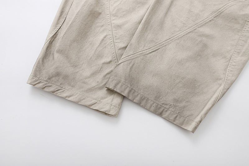 Deconstructed wide-leg cargo pants in light beige