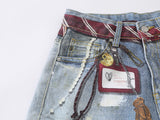 Distressed light blue baggy denim jeans