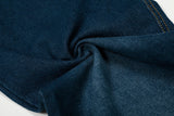 Wide-leg high-waisted denim jeans with ruffled waist
