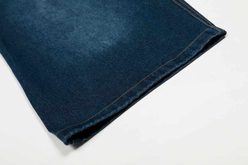 Wide-leg high-waisted denim jeans with ruffled waist