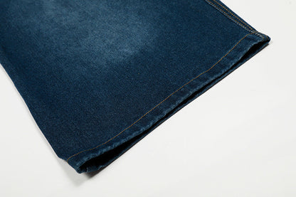 Wide-leg high-waisted denim jeans with ruffled waist