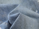 Distressed light blue baggy denim jeans