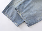 Distressed light blue baggy denim jeans