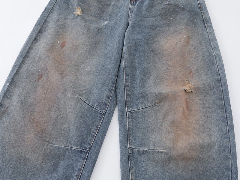 Distressed baggy denim jeans with wide leg cut