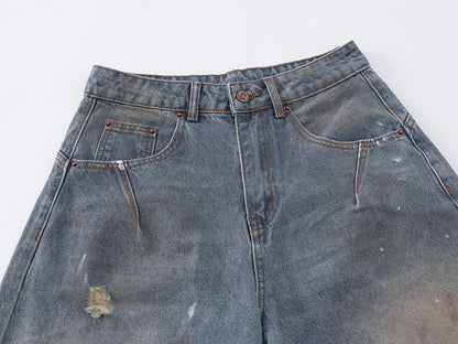 Distressed baggy denim jeans with wide leg cut