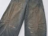 Wide-leg distressed denim jeans