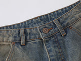 Wide-leg distressed denim jeans