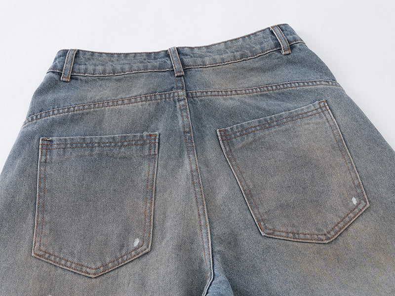 Distressed baggy denim jeans with wide leg cut